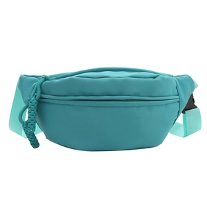 Minimalist mint green crossbody chest bag with adjustable strap and braided zipper pull
