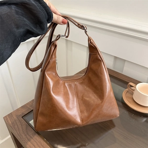 Brown vintage faux leather hobo tote bag with adjustable strap for commuting