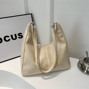 Minimalist beige PU leather hobo tote bag with vintage texture and long shoulder strap