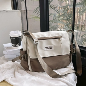 Large capacity canvas messenger bag in beige and brown patchwork for school and commute