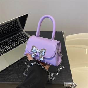 Chic purple mini handbag with silver bow detail and metal chain strap for women
