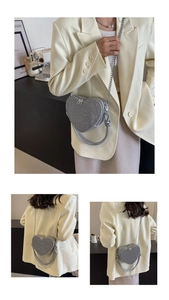 Silver glitter heart-shaped bag with metal chain shown from multiple angles