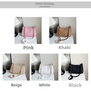 Five crescent shoulder bags in pink, khaki, beige, white, and black with ribbed texture
