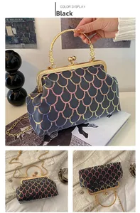 Close-up of black evening bag with colorful sequins and golden ring metal handle