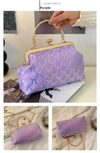 Detail of purple sequin evening bag with gold metal handle and chain strap