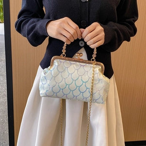 Sparkly sequin dinner bag with vintage metal handle and heart clasp for women