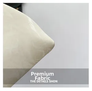 Macro shot of high-quality cream synthetic leather with delicate marble-like texture details
