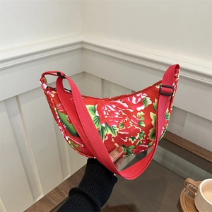 Ethnic style crossbody moon bag featuring traditional red peony floral pattern print
