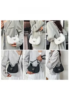 Vues détaillées du sac à bandoulière demi-lune avec une boucle papillon en métal chic