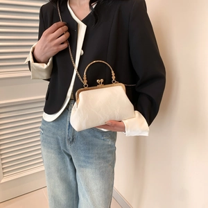 White vintage kiss-lock bag with gold metal handle and chain strap for women