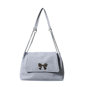 Minimalist light blue shoulder bag with silver bow accent and chain strap
