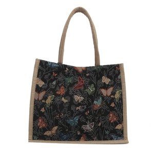 Black jacquard tote bag with colorful butterfly patterns and natural linen handles