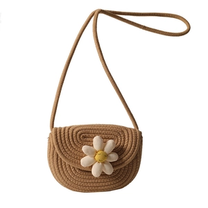 Mini hand-woven straw shoulder bag for children with decorative white daisy flower