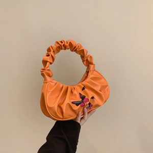 Fashionable bright orange pleated cloud bag with butterfly prints and ruched handle