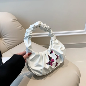 White pleated cloud crescent bag with butterfly print and ruffled handle for women