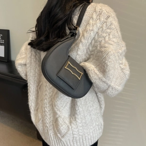 Minimalist crescent shoulder bag in dark gray with decorative golden metal buckle detail