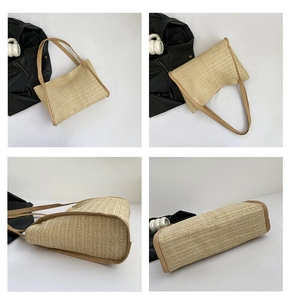 Detail view of woven straw tote bag featuring brown leather trim and reinforced base