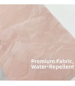 Macro detail of premium water repellent pink pleated fabric texture for handbags