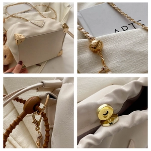 Detailed views of beige drawstring bucket bag with gold corners and chain strap
