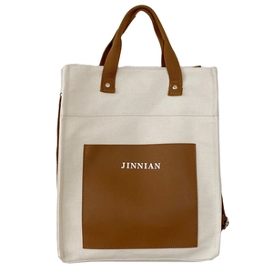 Large capacity minimalist canvas tote bag with brown leather contrast and JINNIAN logo