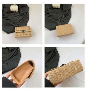 Détails du sac bandoulière en paille tressée avec rivets métalliques et bandoulière chaîne