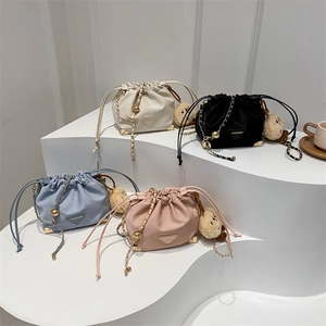 Women Retro PU Leather Drawstring Bucket Bag Fashion Chain Shoulder Crossbody Bag With Metal Corners Solid Color Casual Satchel