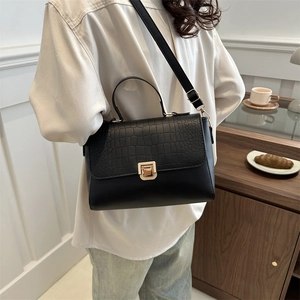 Minimalist black PU leather crossbody bag with crocodile pattern flap and gold lock