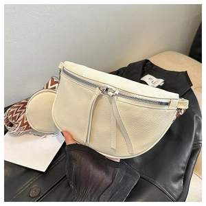 Detail of off-white lychee texture crescent bag with wavy jacquard strap and coin purse