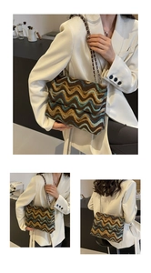 Detail view of woven bohemian plaid tote with colorful texture and metal chain strap