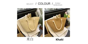 Detail of woven straw tote bags in beige and khaki with thick rope handles for summer