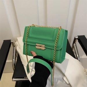 Chic green square crossbody bag with geometric texture and gold chain strap