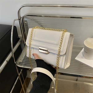 Chic white square crossbody bag with gold chain and quilted texture for women