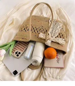 Detail shot of large hollow woven straw bag interior showing spacious storage space