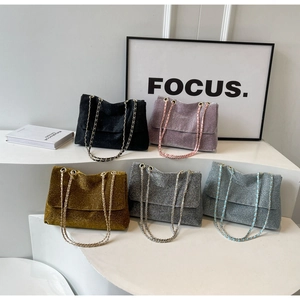 Detailed close-up showing five colors of shimmering sequin tote bags with chain straps