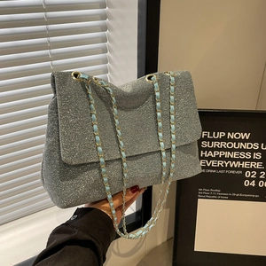Sparkly sequin chain tote bag with blue leather strap for fashionable commuting women