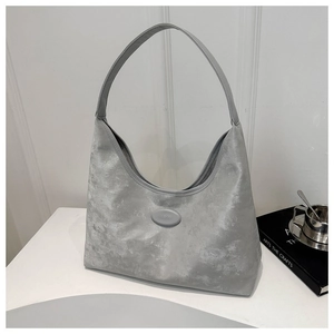 Detail view of grey hobo bag with marble texture fabric and branding logo for daily use