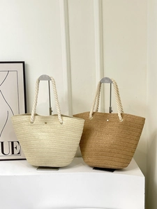 Fashionable large woven straw tote bag with rope handles for summer casual shoulder use