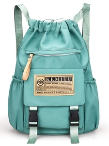 Mint green nylon drawstring backpack with buckle straps for students and travel use