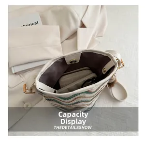 Top view of striped woven bucket bag showing large interior capacity for daily items