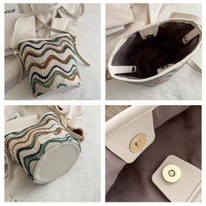 Detailed views of striped knit bucket bag with magnetic clasp and brand label