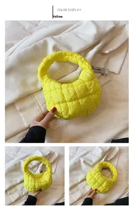 Detailed views of yellow quilted cloud tote bag with puffer texture and integrated handle
