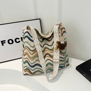 Colorful striped woven velvet tote bag with wave pattern and wide geometric shoulder strap
