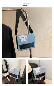 Detail of denim patchwork crossbody bag with star embroidery and adjustable strap
