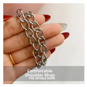 Close-up of comfortable thick silver metal chain strap for saddle shoulder bag