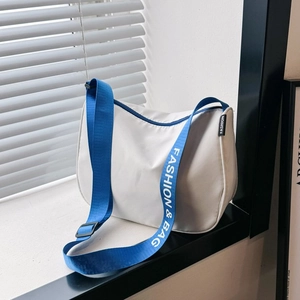 Large capacity off-white canvas crossbody bag with blue fashion logo strap and top zipper