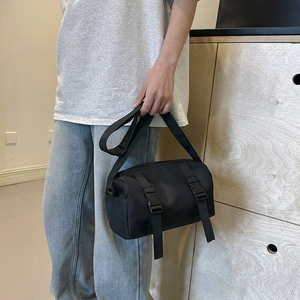Fashionable black nylon cylinder crossbody bag for men and women in street style
