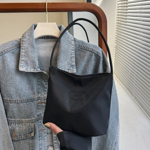 Minimalist black nylon tote bag with pretty and libety embroidery in casual style