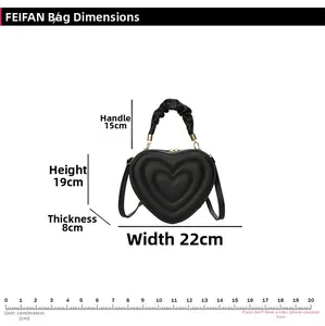 Detailed dimension guide for heart-shaped handbag showing width, height and depth
