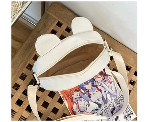 Detail view of the top zipper closure and inner lining of the white bear canvas bag