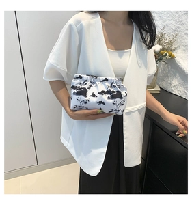 Detail of white nylon pouch with Chinese landscape painting and pleated opening design